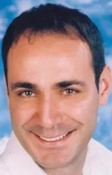 Эркан Север